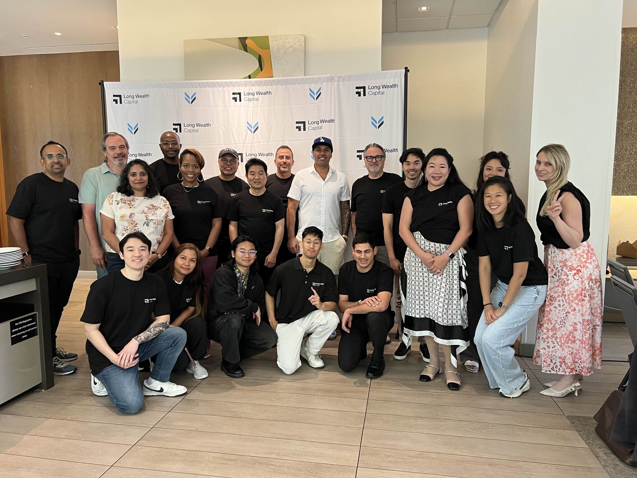 Long Wealth Capital community event with members and team